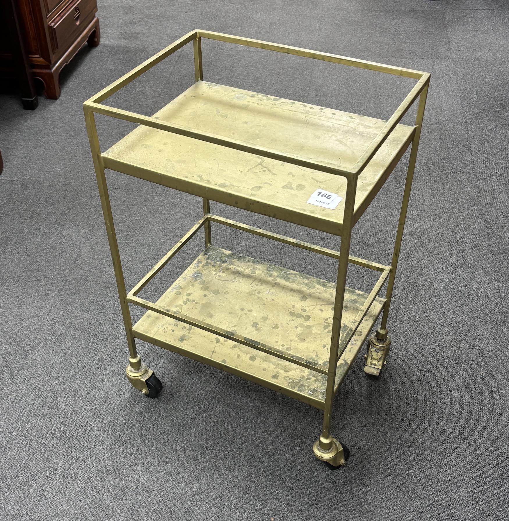 A mid century industrial style gilt metal two tier trolley, width 41cm, depth 31cm, height 62cm